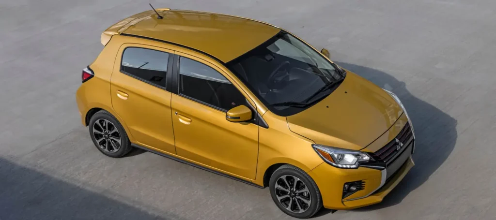 2024-mitsubishi-mirage-yellow-angled best cars under 29k in usa mitsubishi,over view
