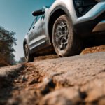 realistic_photo_of_a_modern_suv_parked